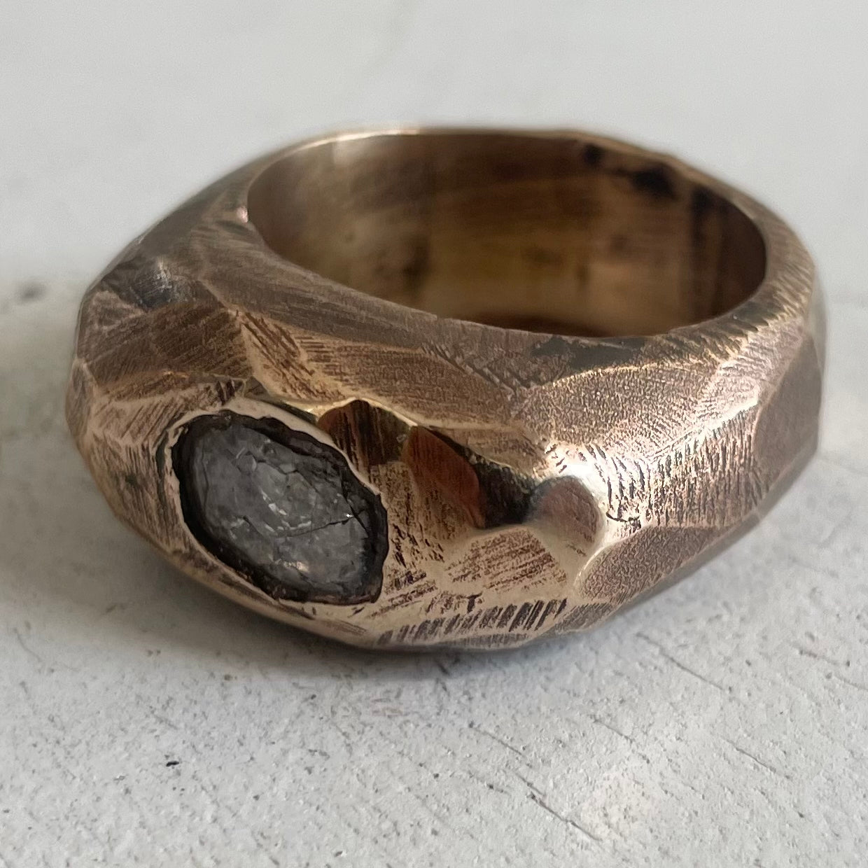 MOON ROCK IN SOLID BRONZE WITH SAPPHIRE