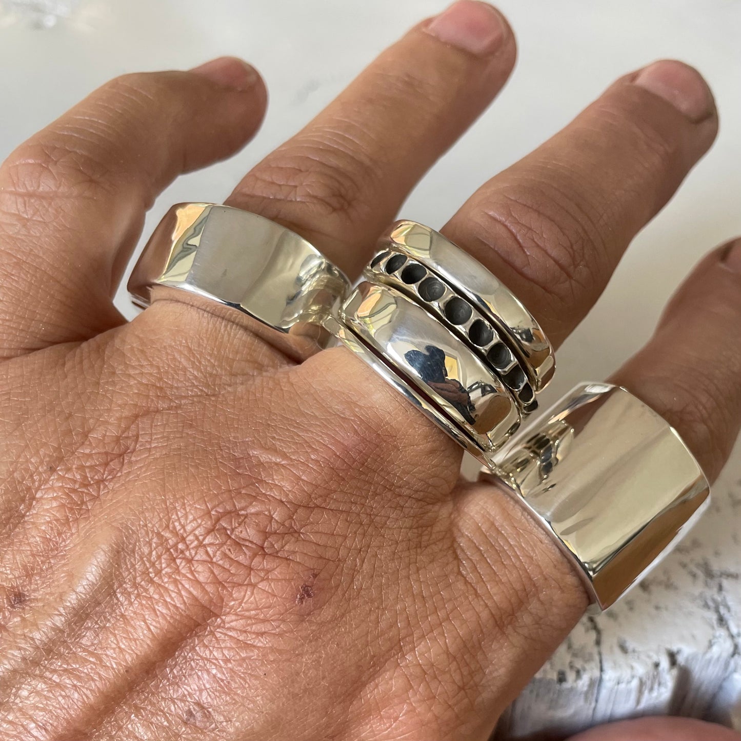 EDGE IN SOLID SILVER.