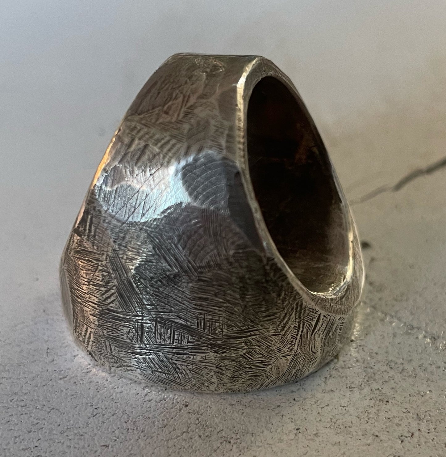 HIDE IN SOLID SILVER.