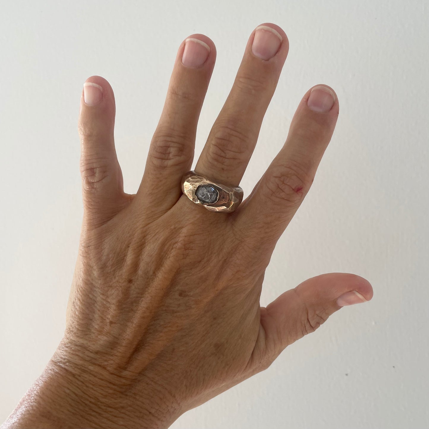 MOON ROCK IN SOLID BRONZE WITH MILKY SAPPHIRE