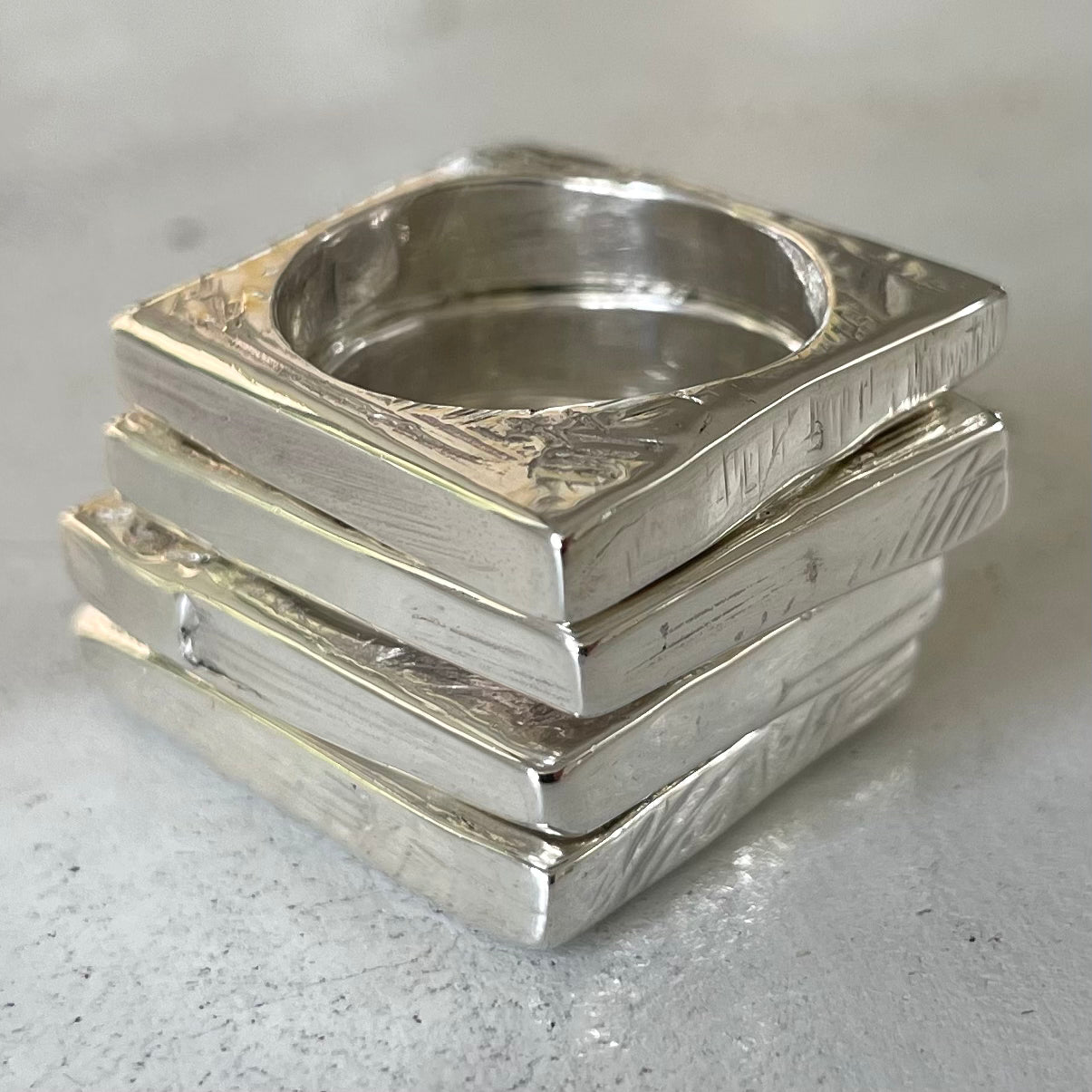 STORY SLICE SET OF 4 IN SOLID SILVER