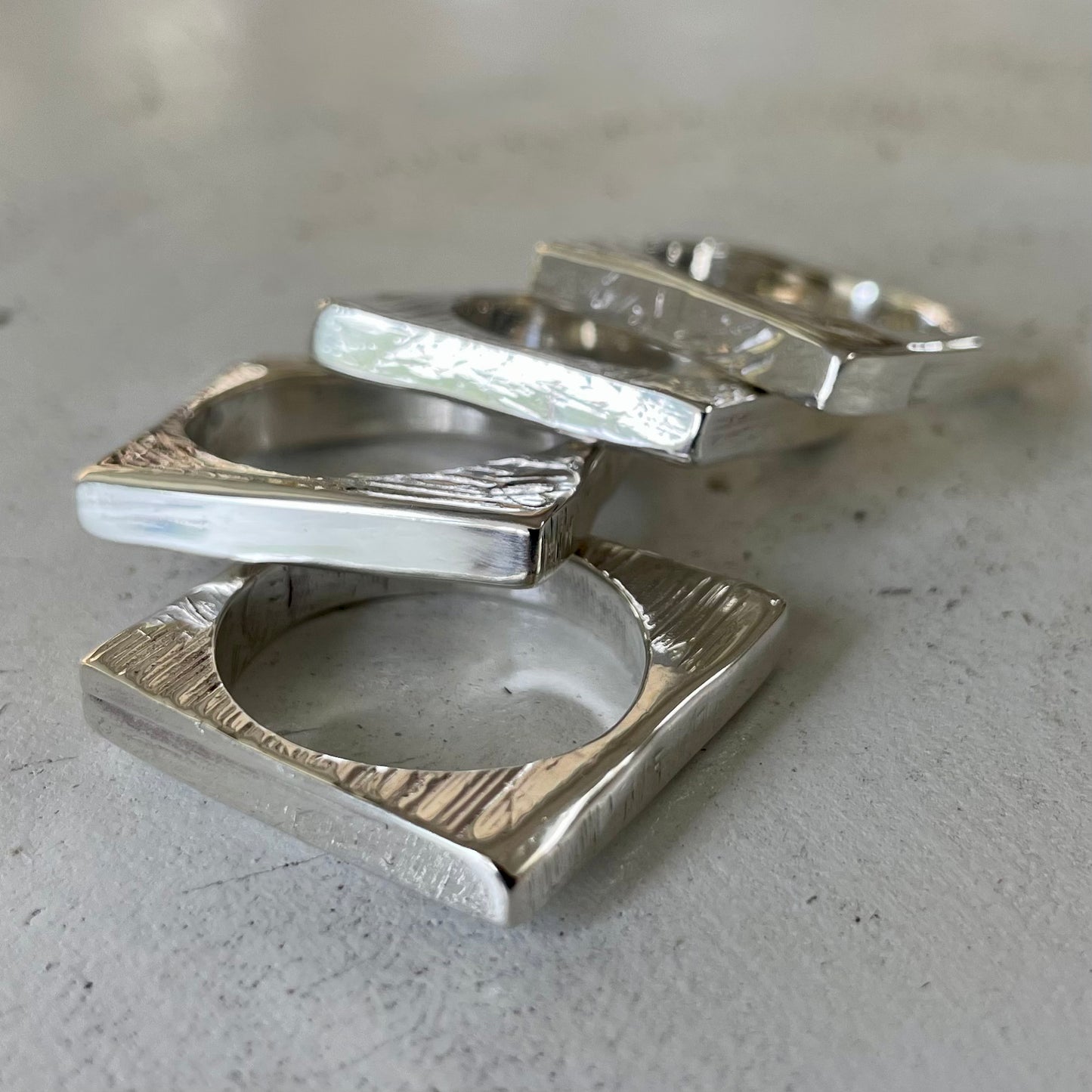 STORY SLICE SET OF 4 IN SOLID SILVER