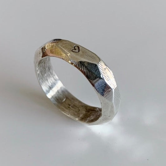 BEATEN CURVES IN SOLID SILVER